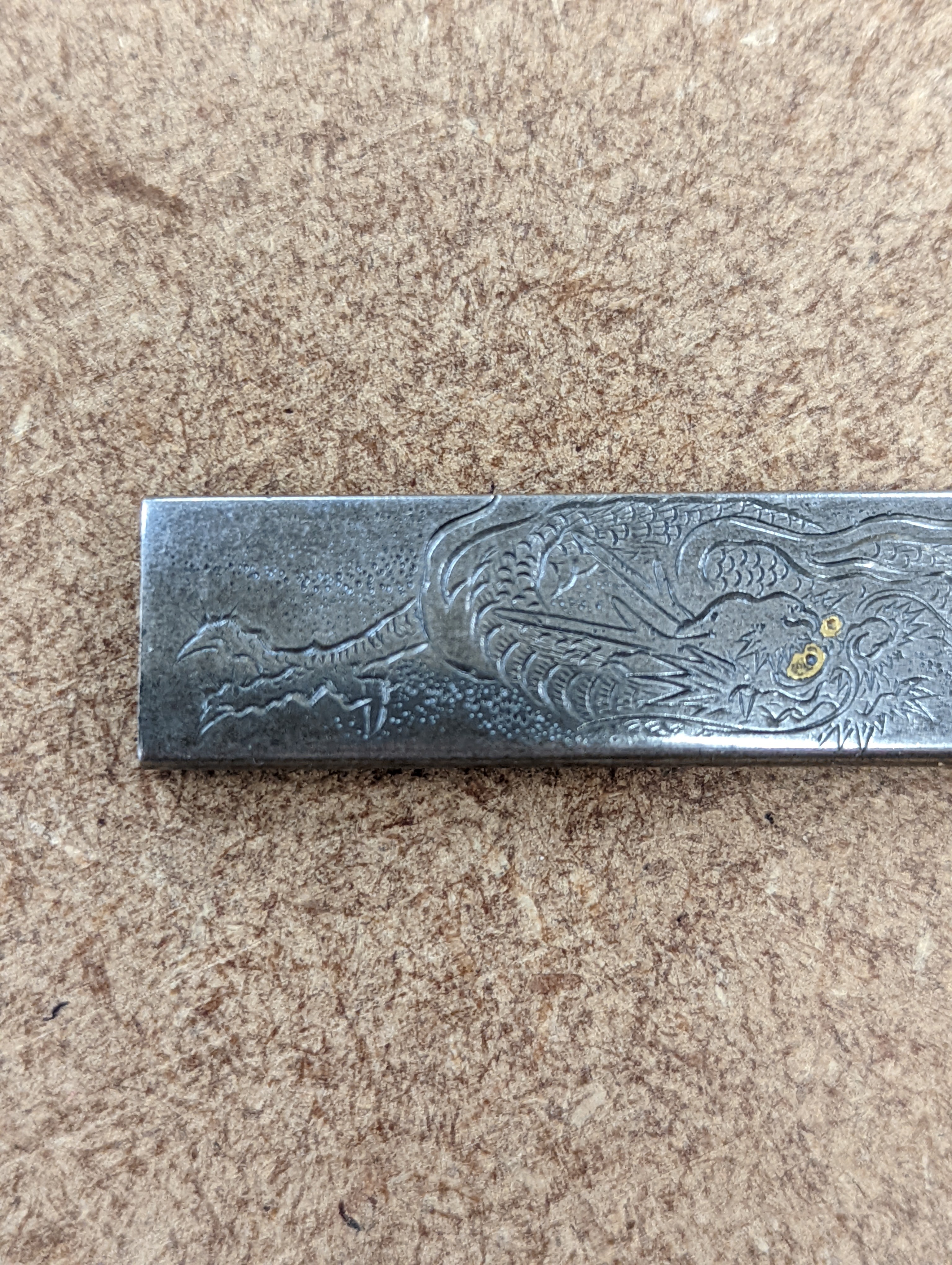 A Japanese mixed metal ‘dragon’ kozuka handle, 19th century, boxed